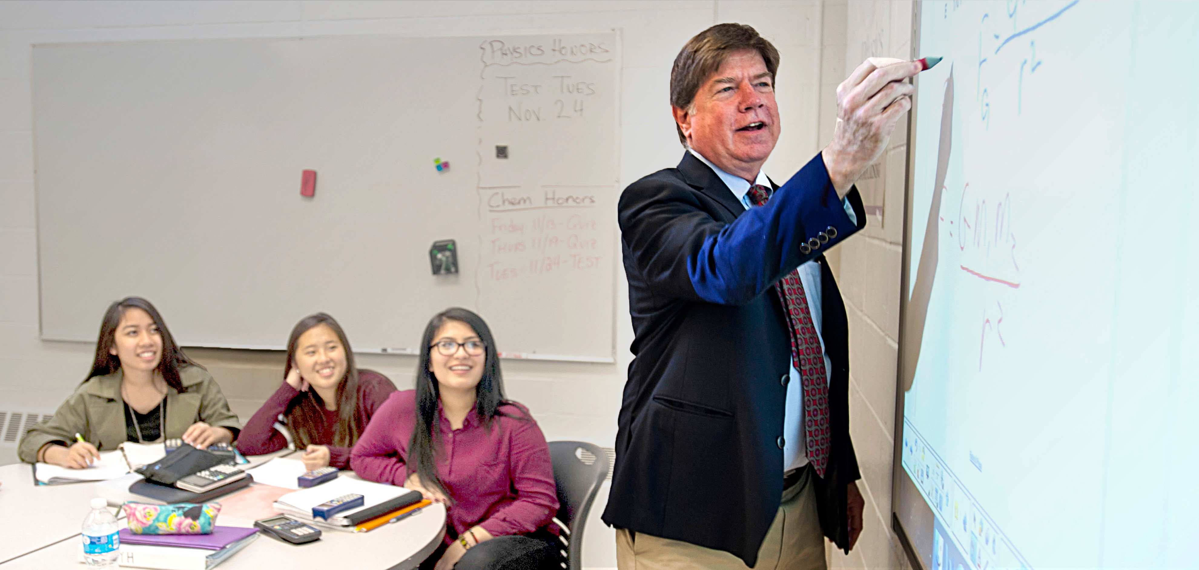 Instructor at a whiteboard